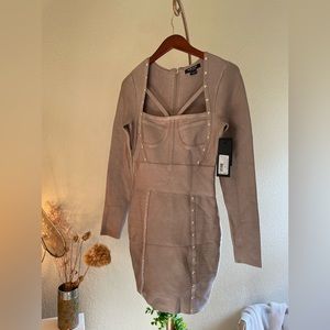 Brand new with tags Guess by Marciano bandage dress in perfect condition.